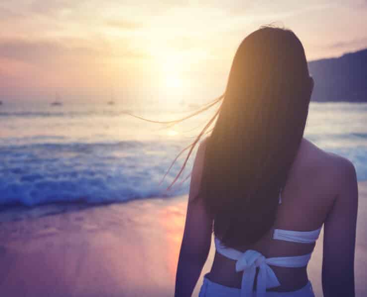 Girl looking at ocean