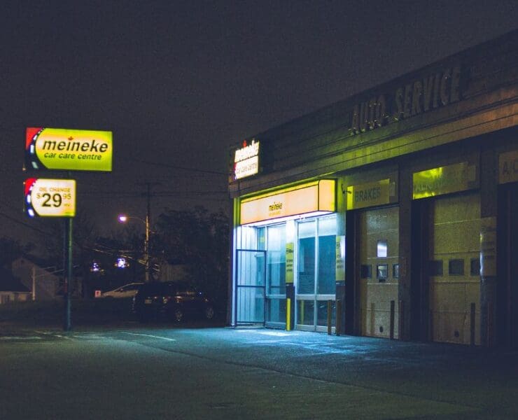 Street-level crime background music with empty shop front at night