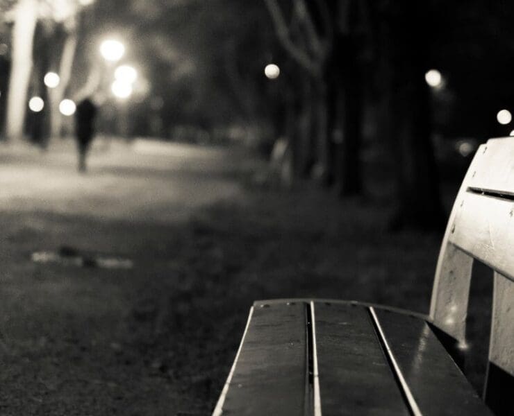 Urban crime investigation background music with shadowy figure in the distance at night