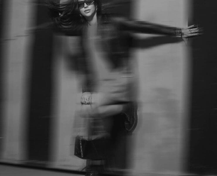 Stylish fashion model walking with motion blur, representing forward movement, confidence, and modern lifestyle visuals